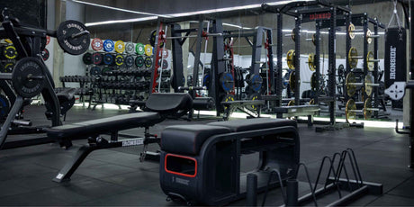 professional commercial gym layout with strength and cardio equipment