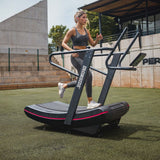 Athlete training on the IRONSIDE Curved Treadmill – Air Runner — commercial cardio equipment for fitness clubs